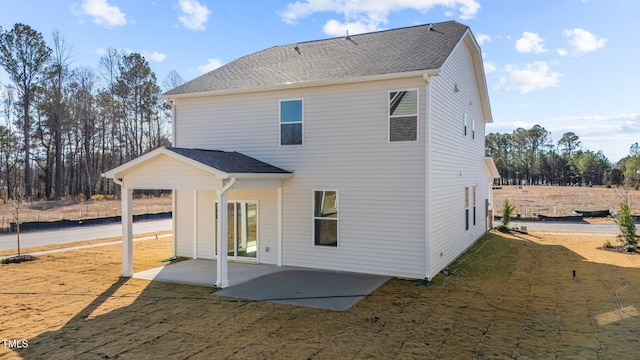 back of property featuring a patio