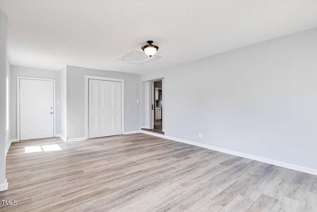 empty room featuring light hardwood / wood-style floors