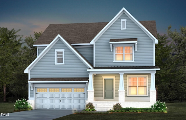 view of front of home featuring a garage