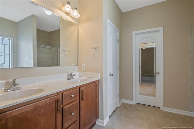 bathroom featuring vanity and walk in shower