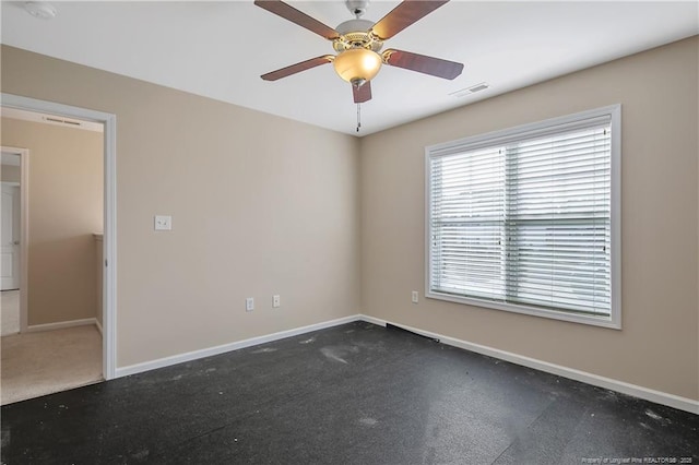 spare room with ceiling fan