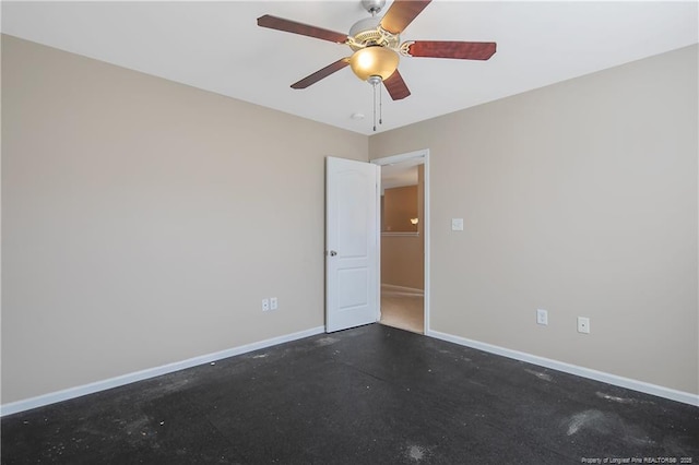 spare room with ceiling fan