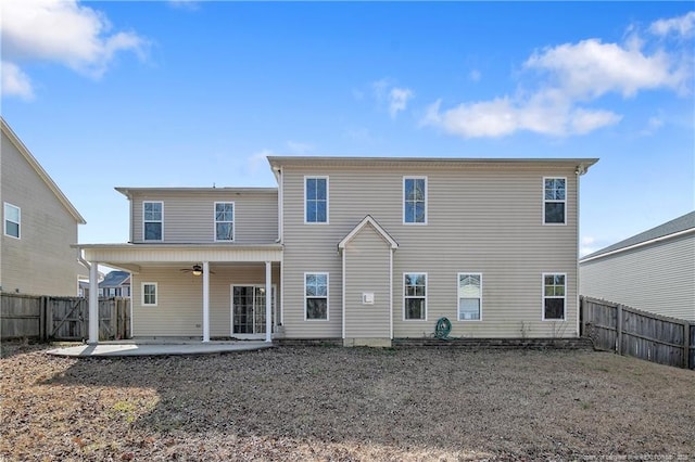 back of house with a patio and ceiling fan