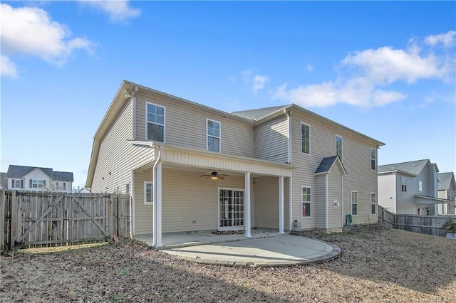 back of house with a patio and ceiling fan