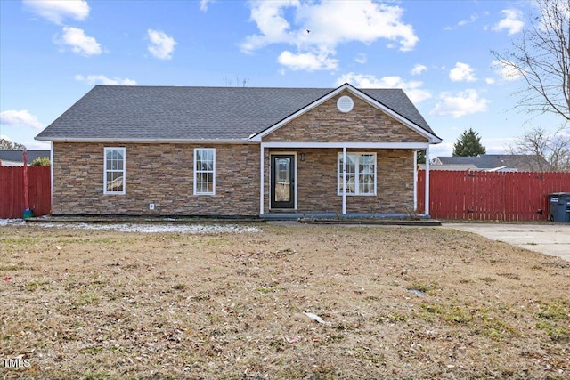 view of front of home with a front yard