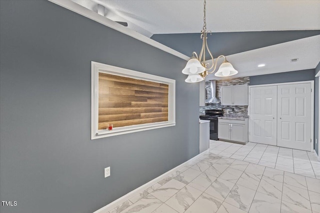 kitchen featuring lofted ceiling, hanging light fixtures, backsplash, black / electric stove, and wall chimney exhaust hood