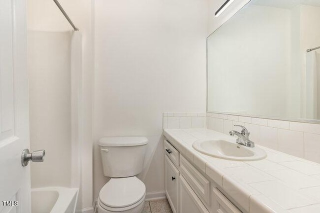 full bathroom with decorative backsplash, tile patterned flooring, vanity, toilet, and shower / bath combo with shower curtain