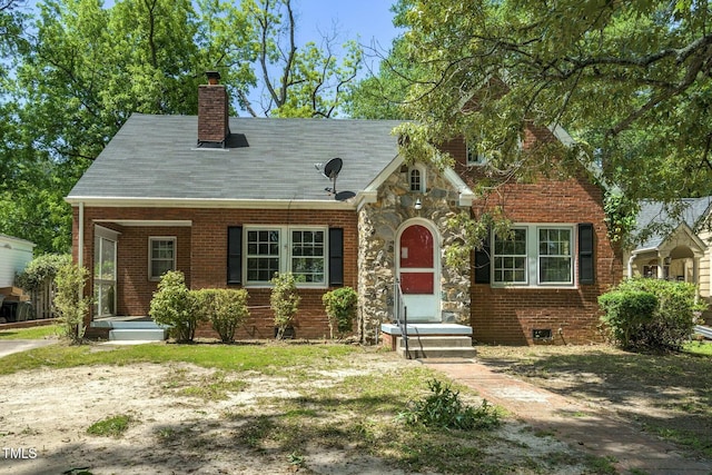 945 Sycamore St, Rocky Mount, NC 27801 - tudor home with brick siding and a chimney
