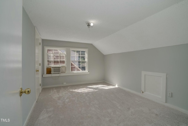 945 Sycamore St, Rocky Mount, NC 27801 - bonus room with carpet, vaulted ceiling, baseboards, and cooling unit