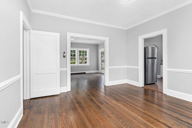 945 Sycamore St, Rocky Mount, NC 27801 - spare room with wood finished floors, ornamental molding, and baseboards
