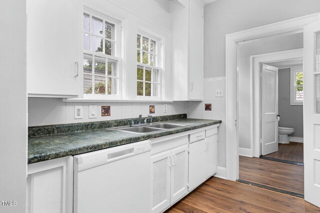 945 Sycamore St, Rocky Mount, NC 27801 - kitchen with dishwasher, dark countertops, white cabinetry, a sink, and dark wood-style flooring
