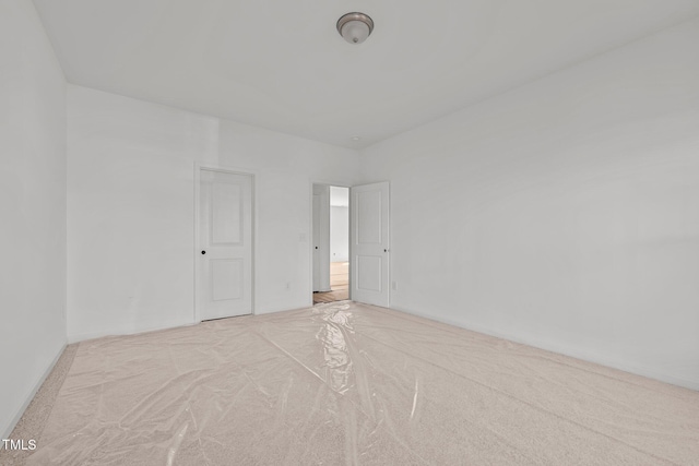 empty room with light carpet