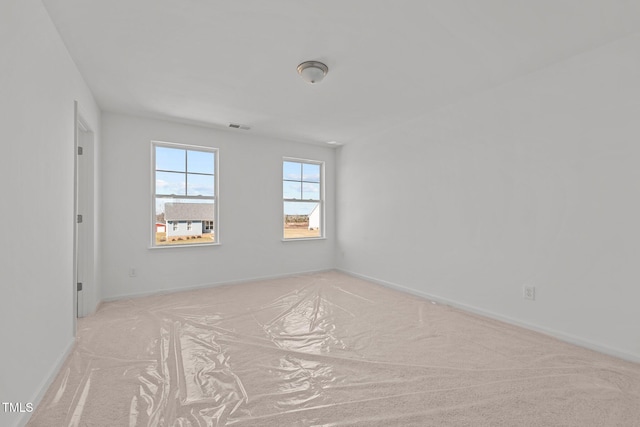 view of carpeted spare room