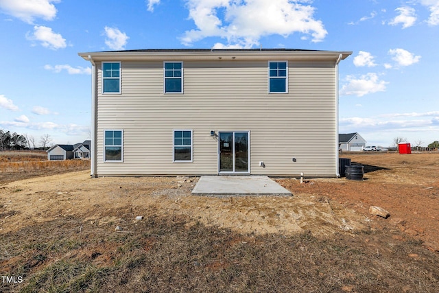 back of property featuring a patio area