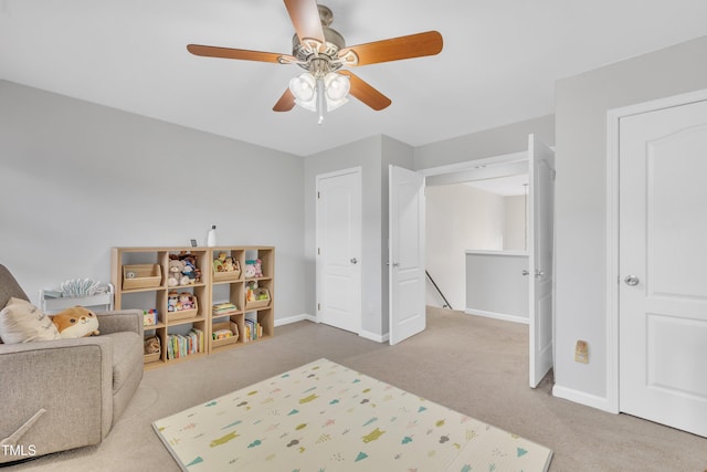 carpeted bedroom featuring ceiling fan