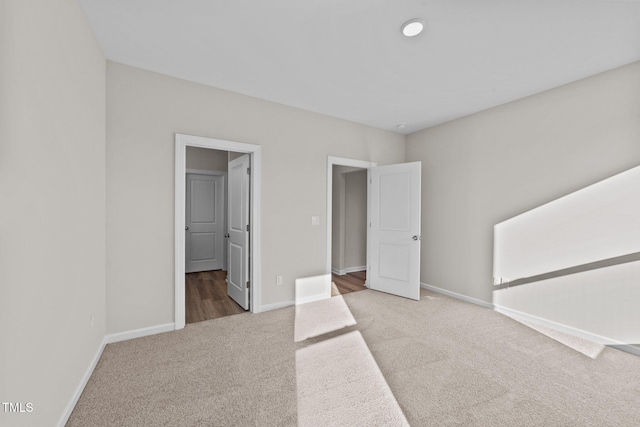 unfurnished bedroom with carpet