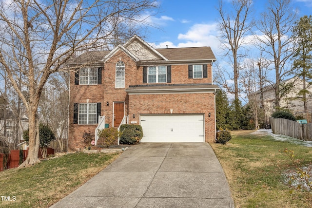 view of front of property featuring a garage and a front lawn