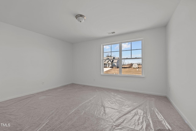 view of carpeted spare room