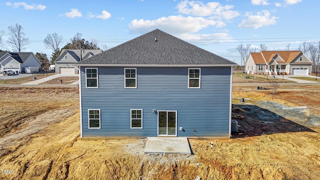 back of property with a patio area