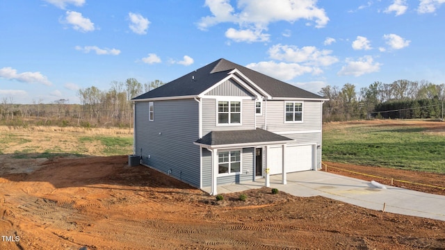 3615 62, Burlington, NC 27217 - exterior space featuring concrete driveway, an attached garage, roof with shingles, and central AC
