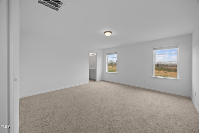 3615 62, Burlington, NC 27217 - empty room with light colored carpet, baseboards, and visible vents