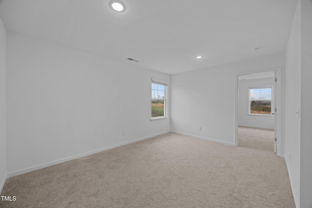 3615 62, Burlington, NC 27217 - carpeted empty room with baseboards, visible vents, and recessed lighting