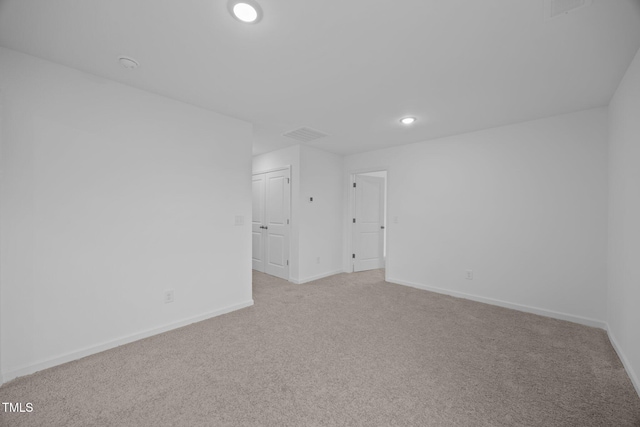3615 62, Burlington, NC 27217 - spare room featuring visible vents, baseboards, recessed lighting, and light colored carpet
