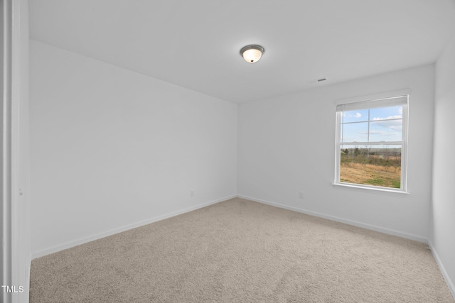 3615 62, Burlington, NC 27217 - empty room featuring baseboards and carpet floors