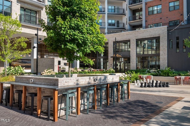 view of patio / terrace featuring an outdoor bar