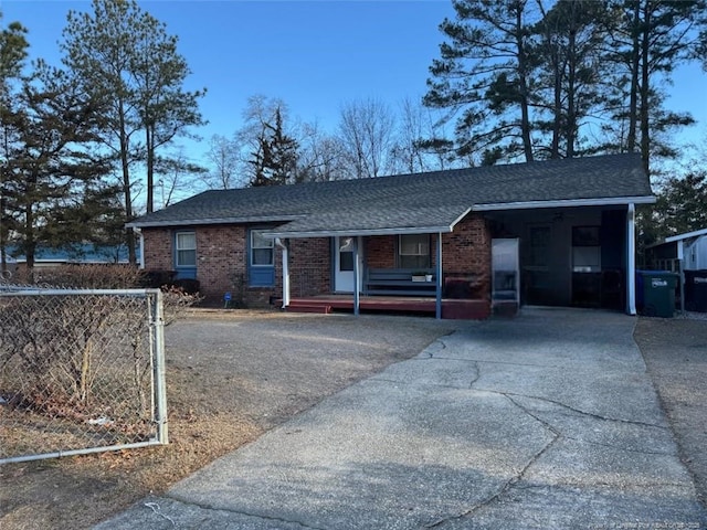 single story home with a carport