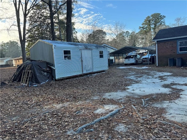 view of outbuilding with a carport