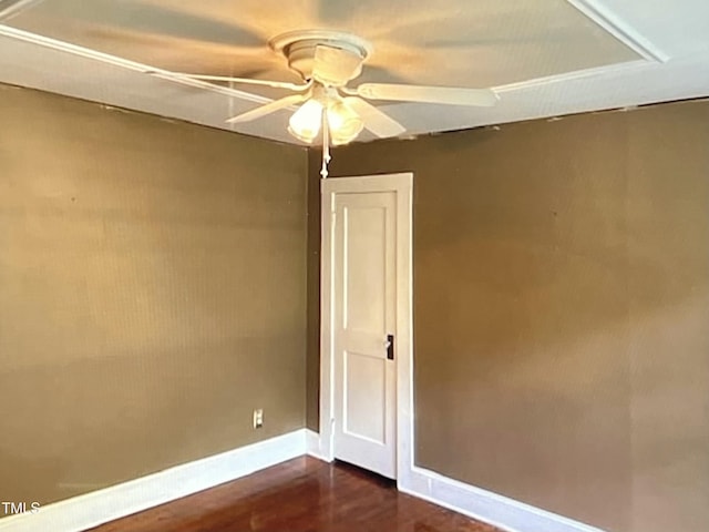 unfurnished room featuring ceiling fan and dark hardwood / wood-style floors