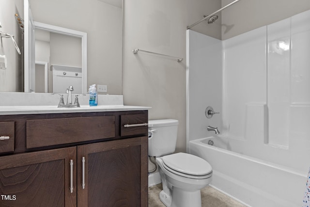 full bathroom with vanity, shower / tub combination, and toilet