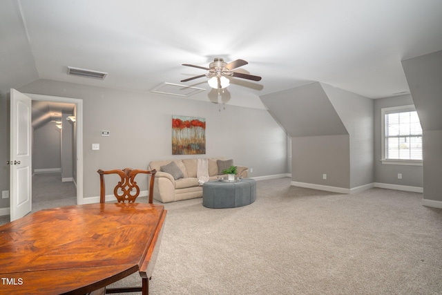 living room with vaulted ceiling, light carpet, and ceiling fan