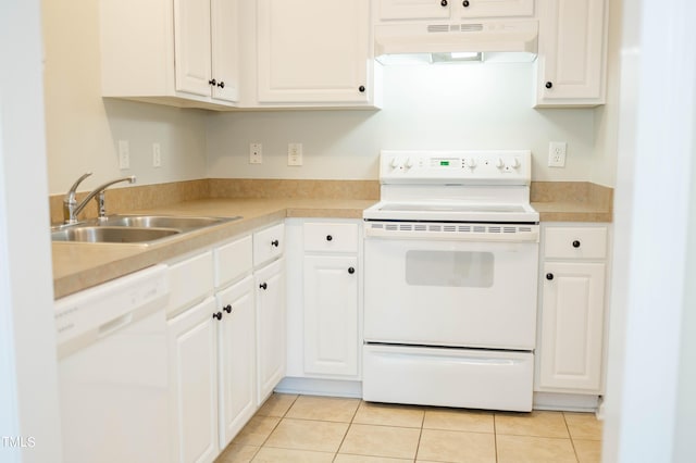 kitchen with white cabinetry, sink, white appliances, and light tile patterned flooring