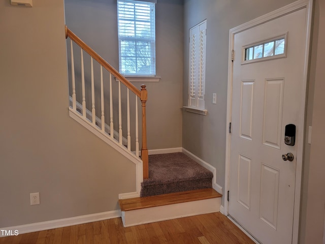 entrance foyer featuring hardwood / wood-style flooring