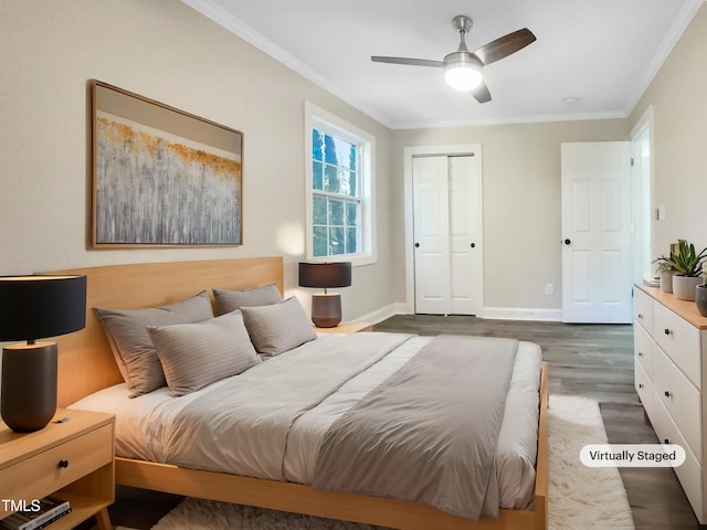 bedroom with dark hardwood / wood-style flooring, ornamental molding, a closet, and ceiling fan