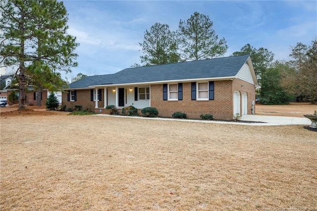 ranch-style home featuring a garage