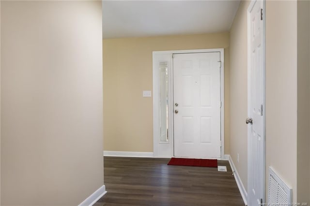 doorway featuring dark hardwood / wood-style floors