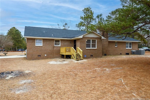 view of front of home featuring central air condition unit