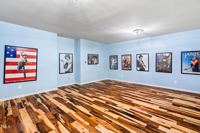 spare room with wood-type flooring