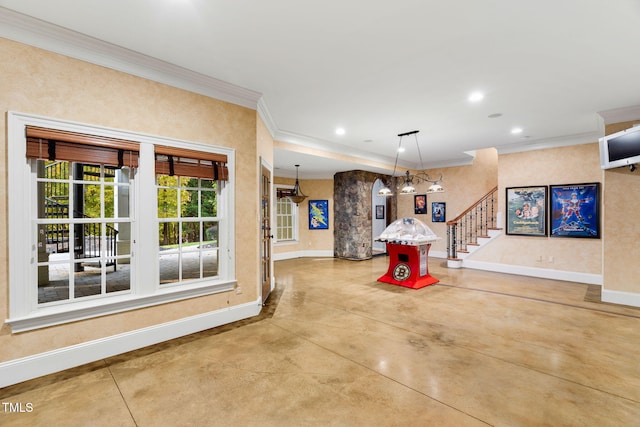 interior space featuring crown molding and concrete flooring