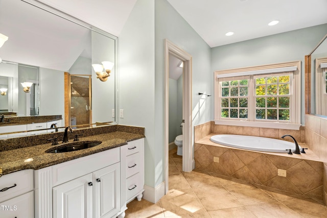 full bathroom with tile patterned floors, toilet, separate shower and tub, and vanity