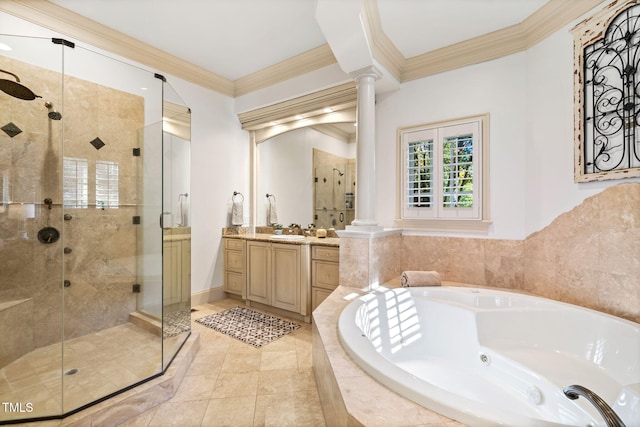 bathroom with ornate columns, vanity, independent shower and bath, and ornamental molding