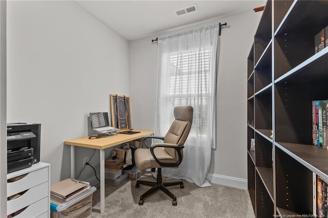 home office with carpet flooring