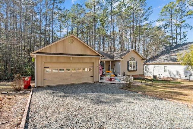 ranch-style home featuring a garage