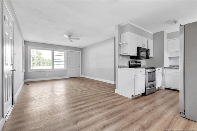 kitchen featuring white cabinetry, light wood-type flooring, ceiling fan, and appliances with stainless steel finishes