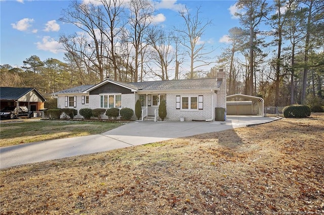 ranch-style house with a carport and a front lawn