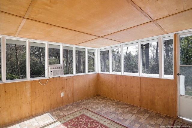 unfurnished sunroom with cooling unit