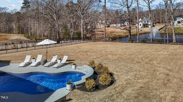 view of pool with a water view and fence